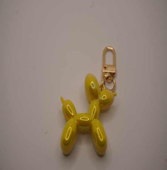 Yellow shiny dog keychain