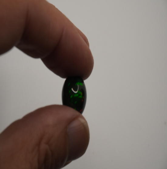 natural black Opal 8.70 carats cabovhon stone (perfect for a ring)